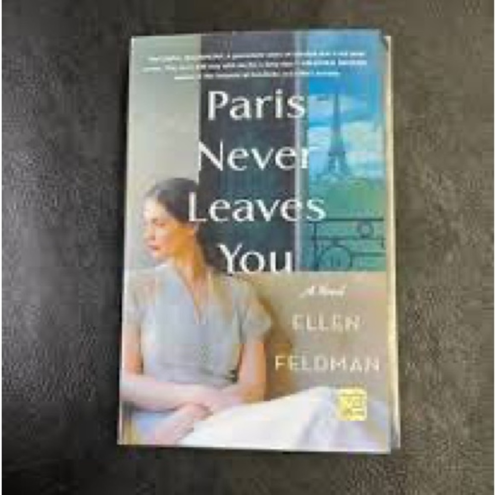 Paris Never Leaves You Book